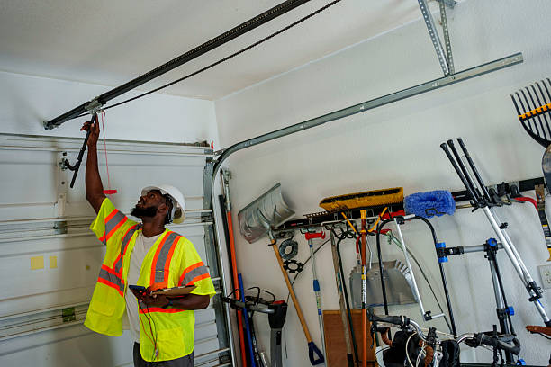 Professional Garage Door Panel Replacement technician working in Eden, NC